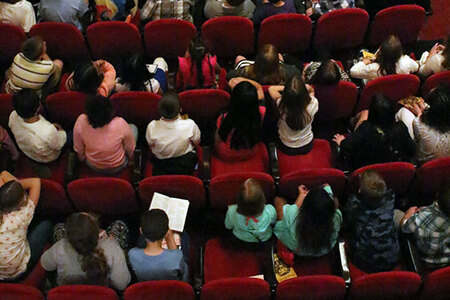 overhead shot of group of students in the theatre auditorium