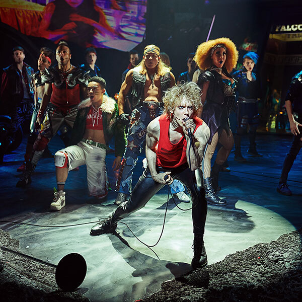 Andrew Polec as Strat & the cast of Bat Out of Hell
