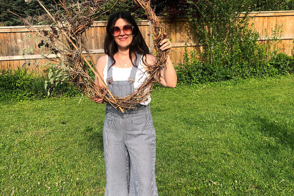 Woman holding medium sized wreath