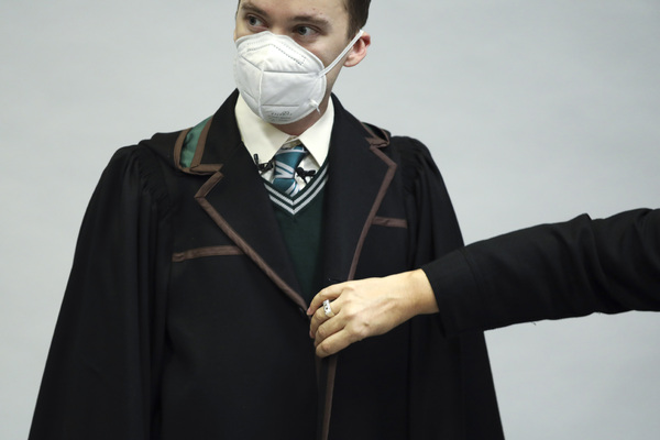 Final adjustments to the Hogwarts School look that Thomas Barnet wears as Scorpius.  