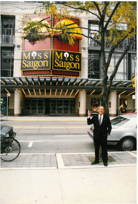 Ed Mirvish stands in front of the Princess of Wales Theatre. Miss Saigon is on the marquee