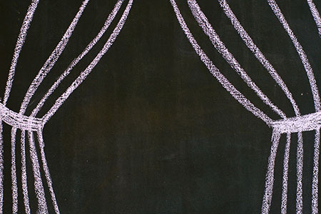 hand drawn chalk curtains on a blackboard