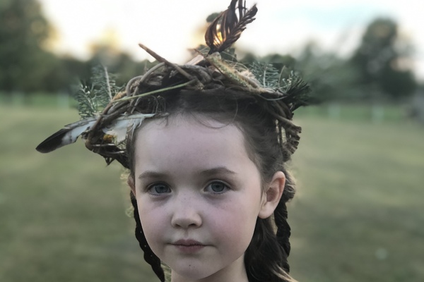 Girl with wreath crown on her head